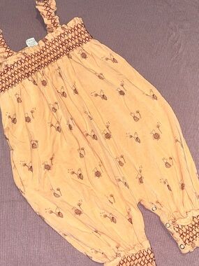 kate quinn Peach Piglet Smocked Baby One-Piece